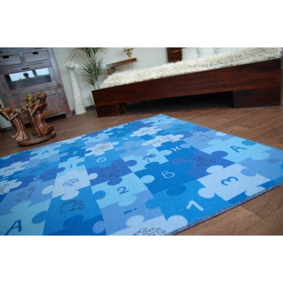 Detský koberec Puzzle - modrý